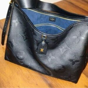 Carryall MM empriente Louis Vuitton